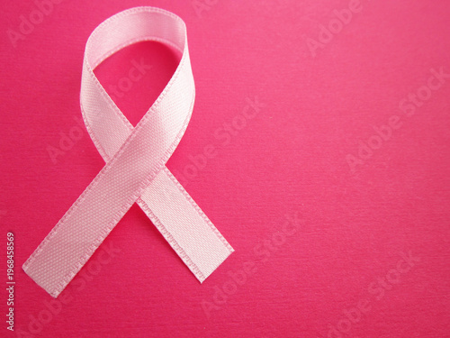        The pink ribbon is a breast cancer awareness symbol.                        