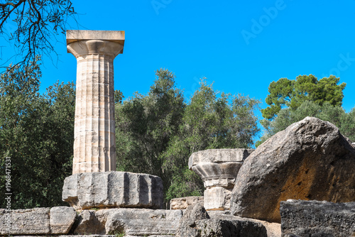 Ancient Doric Column Among Temple Ruins in Olympia