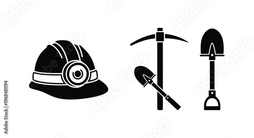 Mining tools including a helmet pickaxe and shovel in silhouette