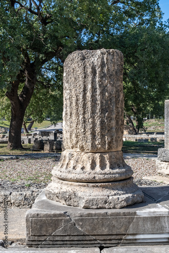 Ancient Column Fragment Among Temple Ruins in Olympia, Greece