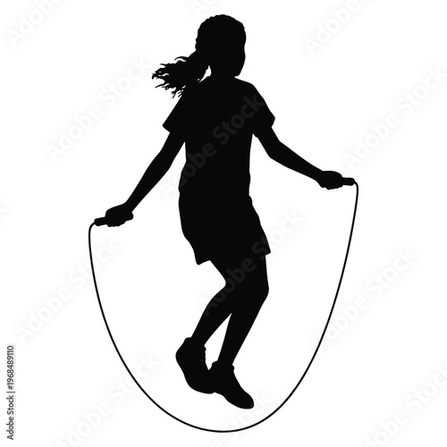 A young girl joyfully jumps rope in a dynamic pose presented as a striking silhouette