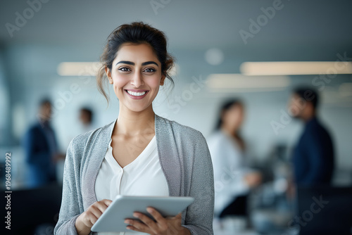 Indian businesswoman working tablet office