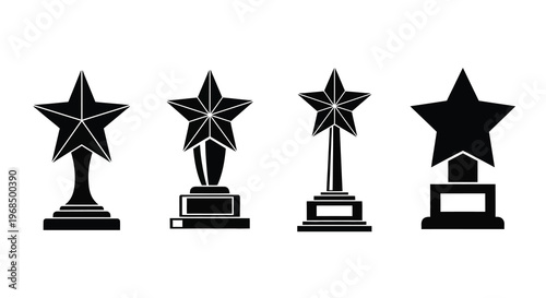 Four black star trophies displayed on pedestals a striking silhouette