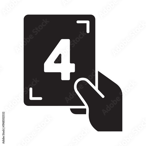 A black silhouette of a hand holding a playing card with the number four