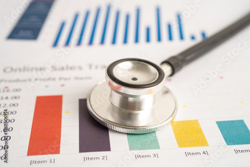 Stethoscope on graph paper, Finance, Account, Statistics, Investment, Analytic research data economy and Business company concept.
