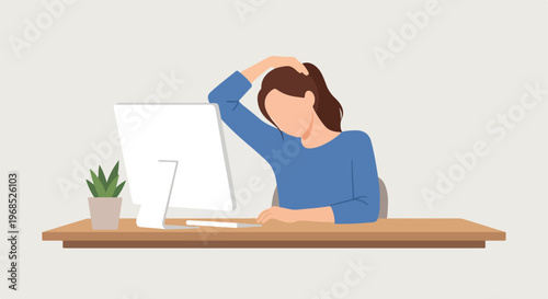 A tired woman sitting at her office desk holding the back of her sore neck area