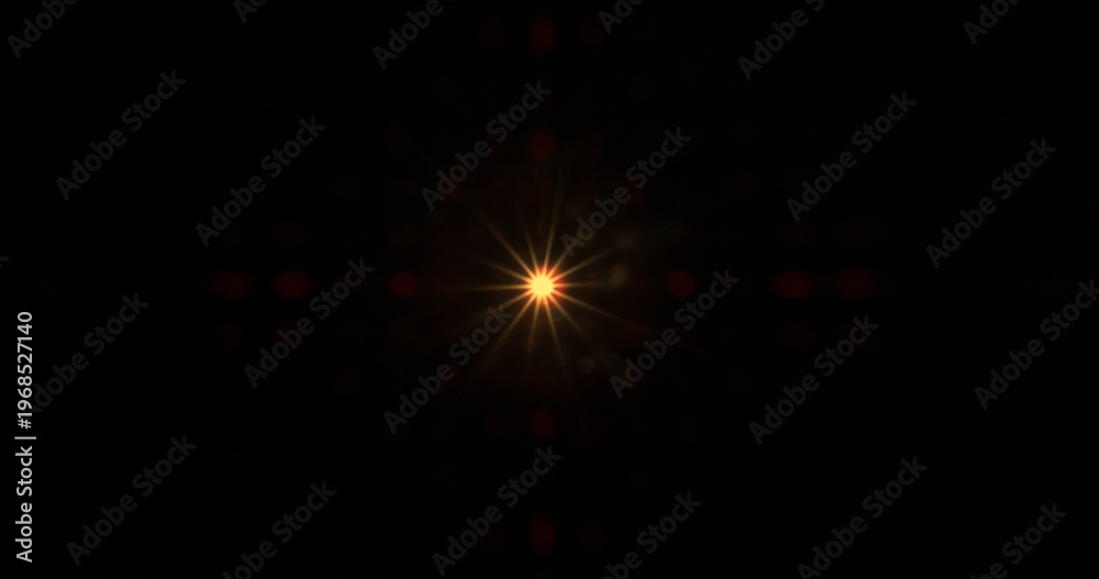 Fototapeta premium Abstract cinematic lens flare with bright light burst and star rays, isolated on black background. Optical light effect ideal for VFX overlays, transitions, titles and dramatic visual accents.