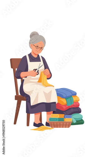 An elderly woman wearing an apron sits on a chair and cuts yellow fabric cloth
