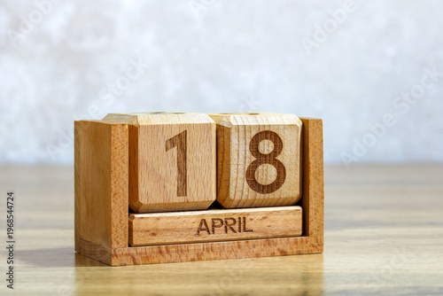 Tableau sur toile Wooden block calendar displaying April eighteenth date