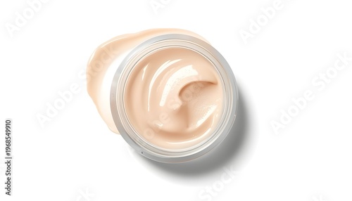 A close-up view of a cosmetic cream in a jar on a white background