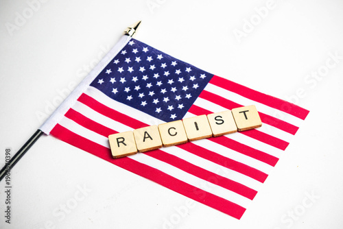 The American Flag With A Racist Sign Across