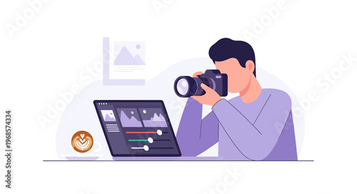 Photographer at work editing photos on a laptop computer with coffee