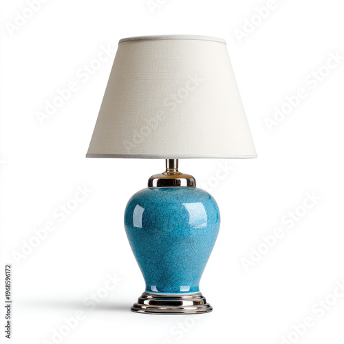 Elegant blue ceramic lamp with white fabric shade and metal base