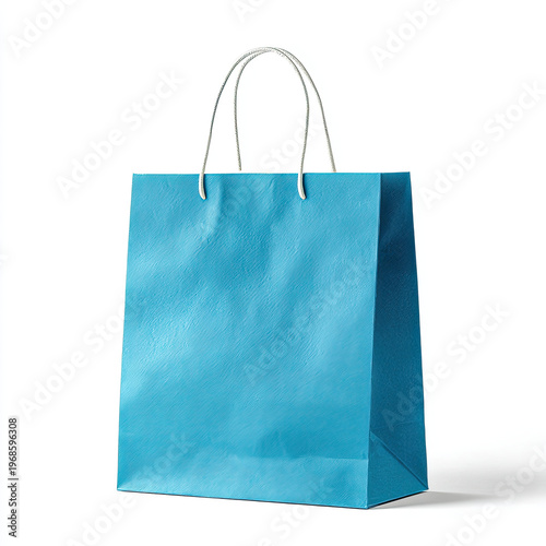 Blue paper shopping bag with white handles on white background
