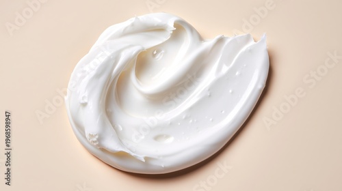 White Organic Skin Cream Swirl Smear on Beige Background