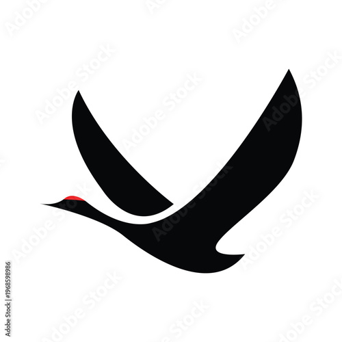 Elegant black bird silhouette in graceful flight, a minimalist vector icon symbolizing freedom, nature, and aspiration