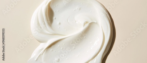 Creamy White Moisturizer Swirl with Moisture Droplets Macro Shot