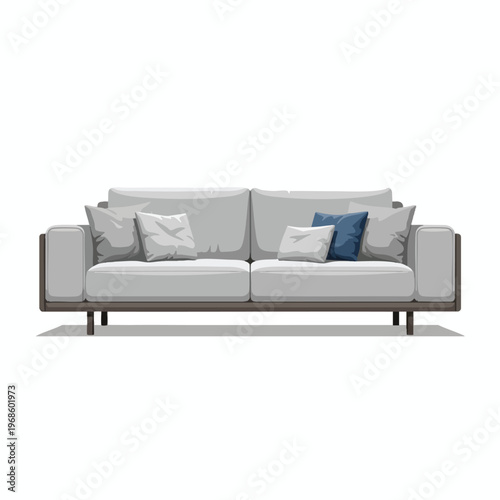 A modern, low-profile gray sofa with blue and gray accent pillows