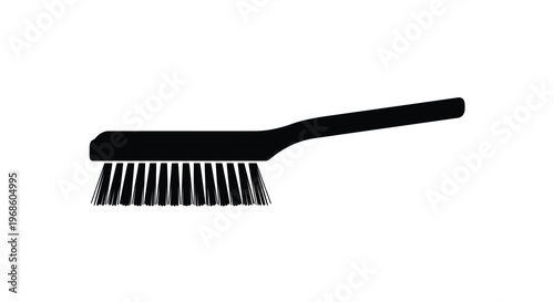 Simple black silhouette of a cleaning brush laying on a white background