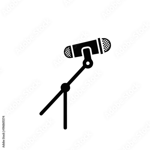 Microphone on a stand symbolizing broadcasting, performance, and vocal recording.