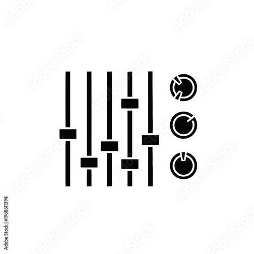 Audio mixing board sliders and knobs representing sound control and adjustment in production.