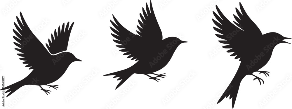 Naklejka premium Three black silhouettes of birds in flight