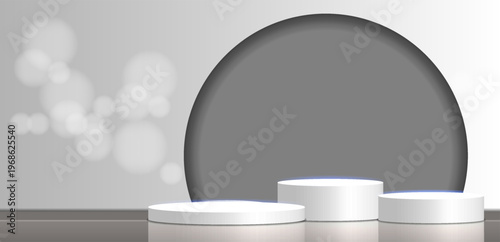 A modern and clean 3D render featuring three white cylindrical pedestals for product showcases. The scene has a monochromatic gray background with a large circle and soft bokeh lights