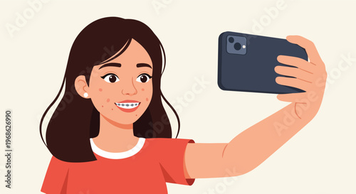 A young woman with brown hair and braces taking a selfie with a smartphone device