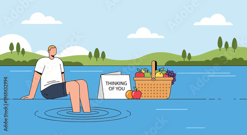 Man Relaxing by Water with Picnic Basket and 'Thinking of You' Card