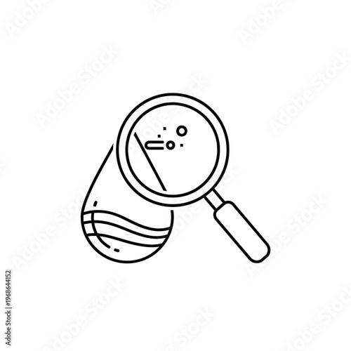 Magnifying glass examining a specimen.