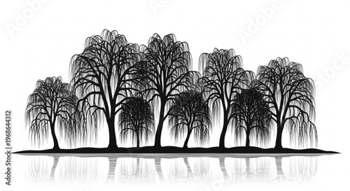Silhouette of bare trees on a serene lake shore at dusk with reflections on calm water surface