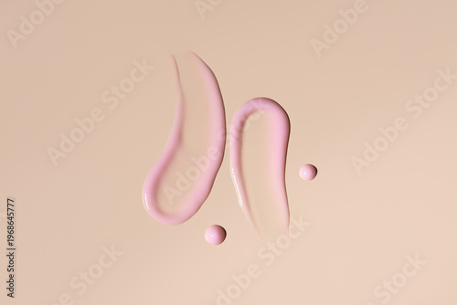 Pink cosmetic smears of cream texture on a beige background. Skin care