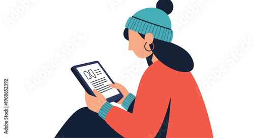 Young woman reading digital news on a tablet device