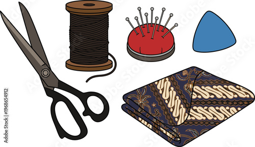 A set of sewing tools and fabric on a table indoors