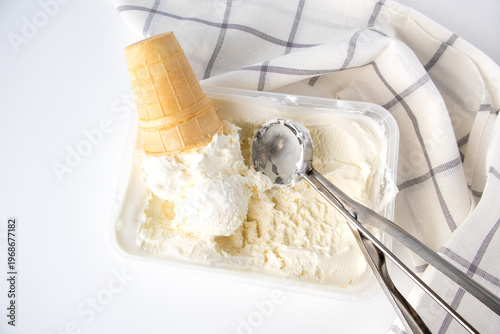 Vanilla Ice Cream with Scoop and Waffle Cone