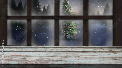Animation of snow falling over christmas tree and winter scenery seen through window