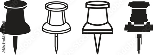 A set of four different push pins on a white background