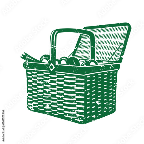 Green wicker picnic basket with lid open and utensils inside
