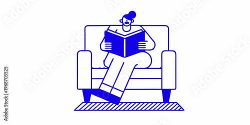 A woman comfortably seated in an armchair intently reading a book