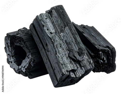 Dark, rough, natural charcoal chunks clustered together
