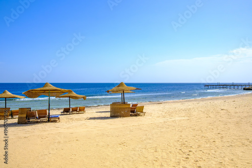 beach with umbrellas