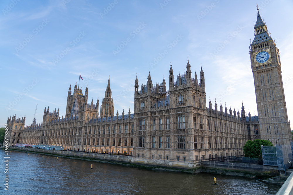 Fototapeta premium Big Ben and Westminster Hall Seen from a Bridge as the Sun Sets in London England