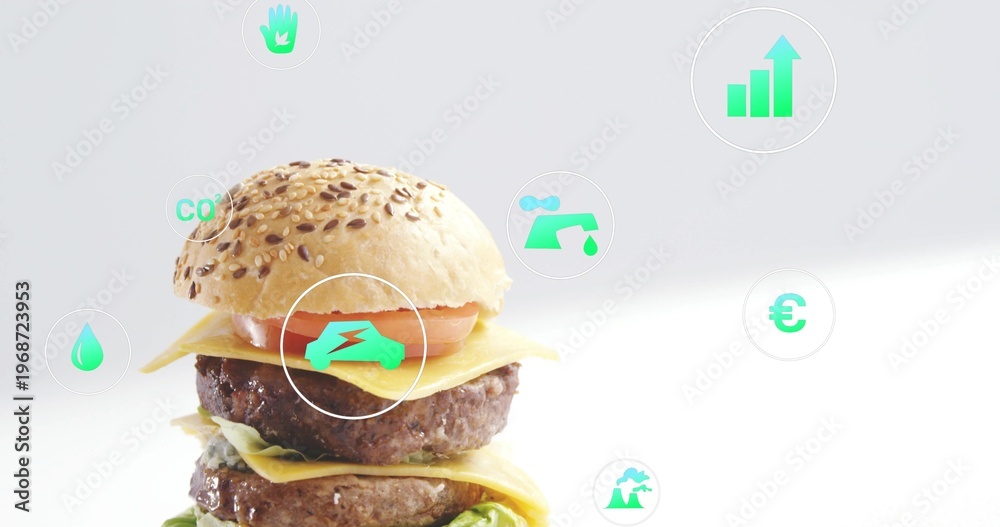 Fototapeta premium Presenting seeded double cheeseburger stacked on bright studio surface, showing turquoise eco icons