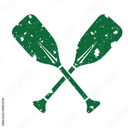 Green distressed kayak paddles crossed