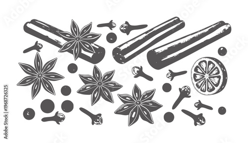 Assortment of star anise cinnamon sticks cloves and orange slice