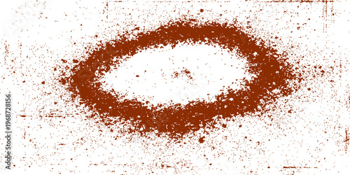 Abstract closeup of roasted coffee beans and dark stains on a brown grunge background with a hot espresso cup featuring creamy milk foam and a hint of cinnamon