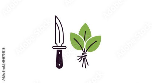A knife next to a bunch of green leaves.