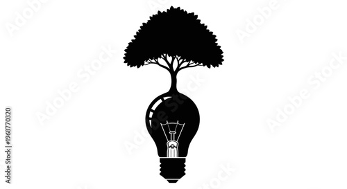 Eco-friendly concept with tree growing from light bulb.
