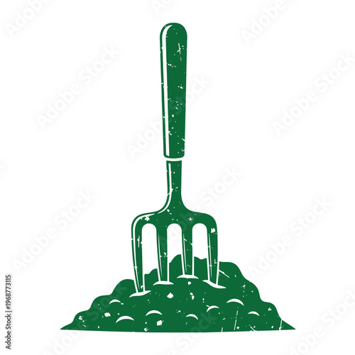 Green garden hand fork stuck in a pile of soil for planting and landscaping isolated on a white background with a distressed grunge texture effect