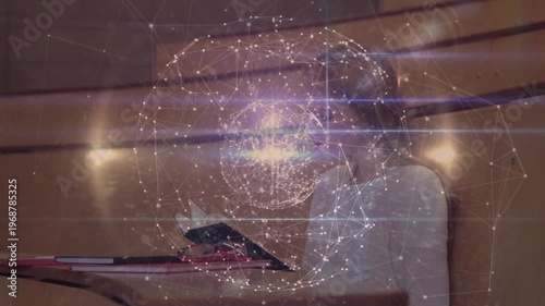 Female student reading open book for study, animated globe appearing and highlighting notes